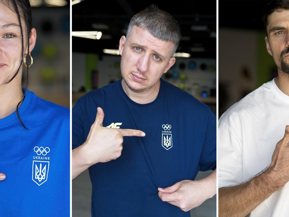 Breaker Kateryna Pavlenko (from left), team manager Georgii Matiukhin and coach Denys Semenikhin show their pride in representing Ukraine at the Olympics.
