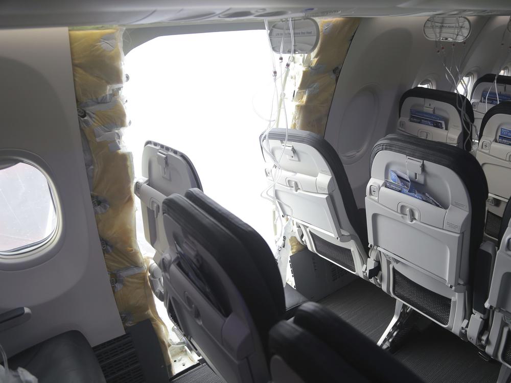 This image shows the section of a Boeing 737 Max where a door plug blew out while Alaska Airlines Flight 1282 was at 16,000 feet in January. 