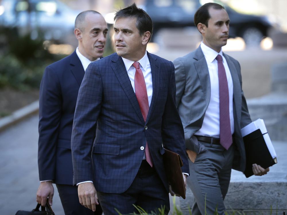 Attorneys for former President Donald Trump Todd Blanche (C) and Emil Bove (L) arrive at the court house in 2023 in Washington, D.C.