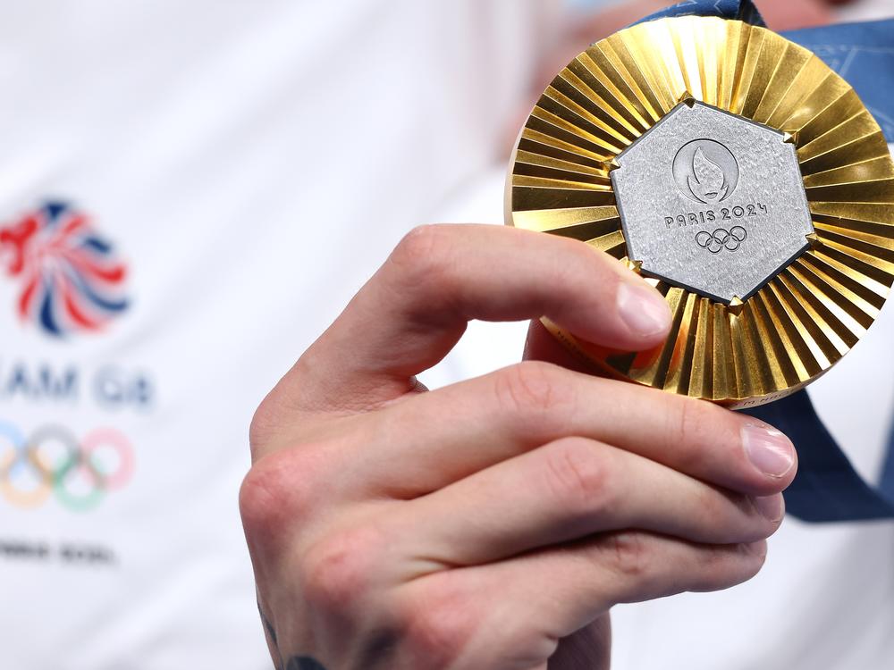Gold medals are the big prize in Paris. China and the U.S. are running neck and neck when it comes to gold. But on a per capita basis tiny Australia is punching above its weight.