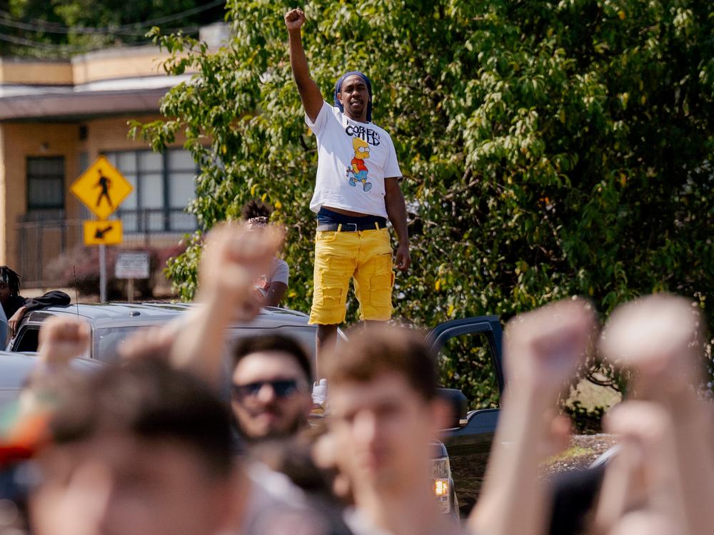 Roland Garner, 39, of St. Joseph, Missouri, joins hundreds of demonstrators, during a unity march.