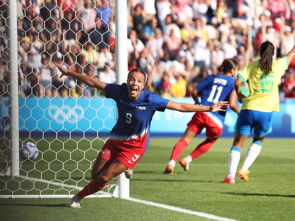 Mallory Swanson celebrates scoring against Brazil in the women's Gold Medal match between Brazil and United States of America Saturday at the Paris Olympics.
