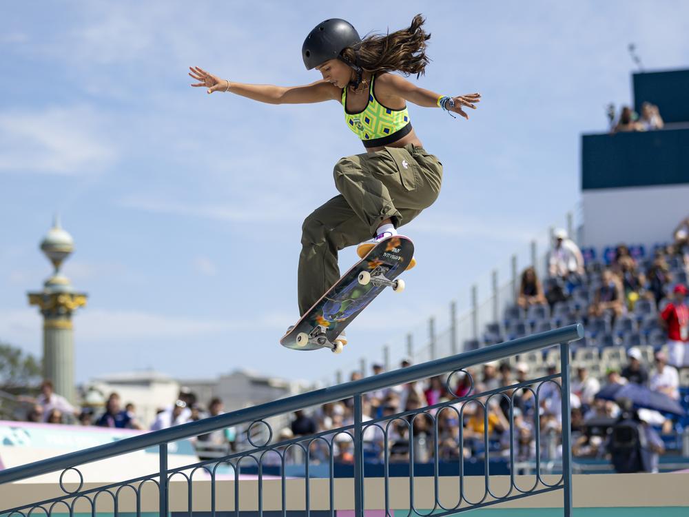 Rayssa Leal of Brazil competes in the women's skateboarding street final at the Place de la Concorde. She won a bronze medal. The 16-year-old Olympian remembers that when she was a kid, a pair of sneakers without holes were an implausible dream.