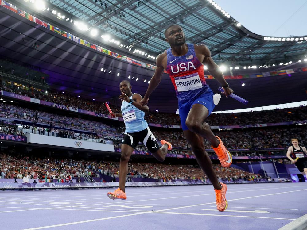 Rai Benjamin of Team USA crosses the line in first to win gold in the men's 4 x 400m relay final on Saturday. Botswana won silver and Great Britain the bronze.