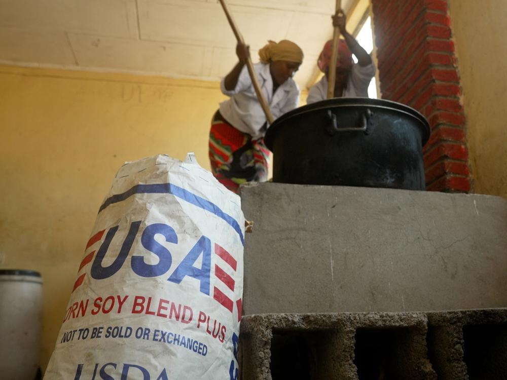 Workers prepare food at the Anderkelo primary and middle school in Ethiopia's Afar region, where a U.S.-supplied blend of corn and soy distributed by the U,N,'s World Food Programme provides a daily meal for hundreds of students in a region where food access is severely limited.