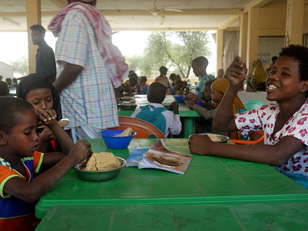Mohammed (right) is a student at the Anderkelo primary and middle school in Ethiopia's Afar region, which he attends with four of his siblings. His mother has passed away and his father Johar Hate Ali says as a parent he now relies on free, daily school meals to ensure most of his children get to eat at all.