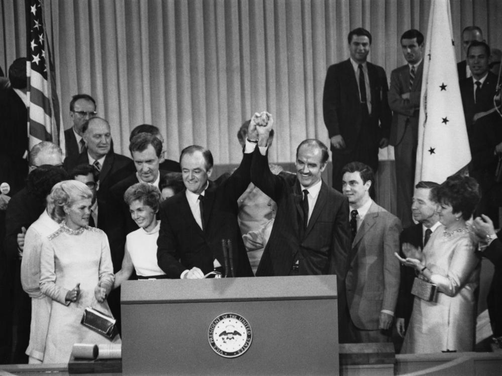 American politician Hubert Humphrey and defeated nominee, American politician George McGovern after Humphrey had been nominated as the 1968 presidential election on the final day of the 1968 Democratic National Convention, held at the International Amphitheatre in Chicago, Aug. 29, 1968.
