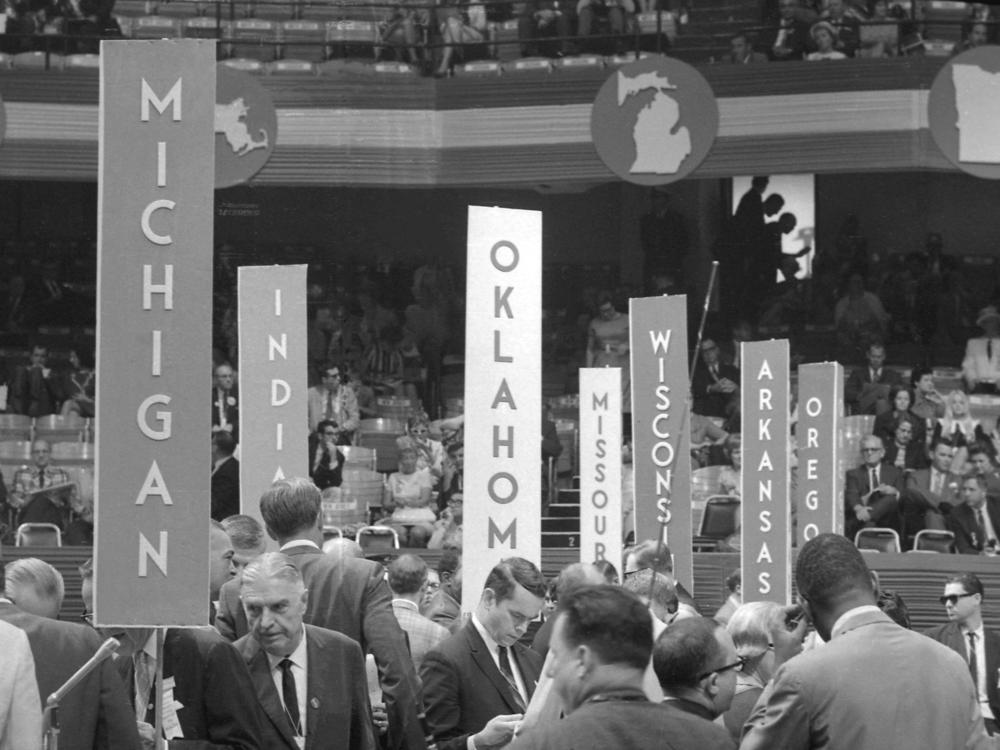 General view of the delegates from different states sit and stand during the 1968 Democratic National Convention, held at the International Amphitheatre in Chicago, Aug. 28, 1968.