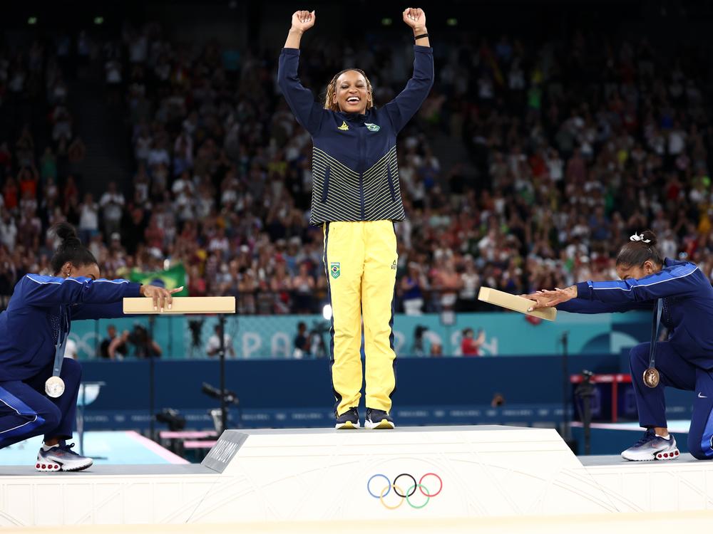 This moment - when silver medalist Simone Biles (L) and bronze medalist (R) Jordan Chiles of the U.S. bowed at gold medalist Rebeca Andrade (C) of Brazil - was one of the most memorable medal ceremonies at the Paris Olympics. Now, with questions swirling about the status of Chiles' bronze medal, it may just be a fleeting memory.