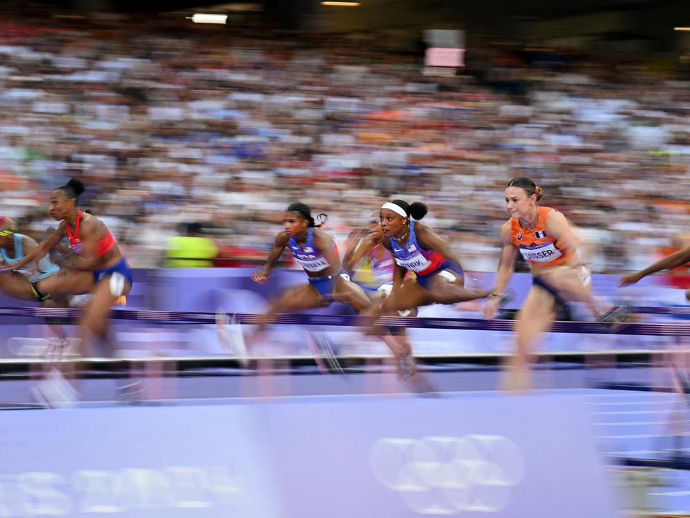 The crowd ROARED during every running event at the Stade de France. During the women's 100m hurdles final, the runners were so fast it was all just a blur. But the electric noise of the place was always there. Sometimes you'd see fans and photographers wearing ear plugs.