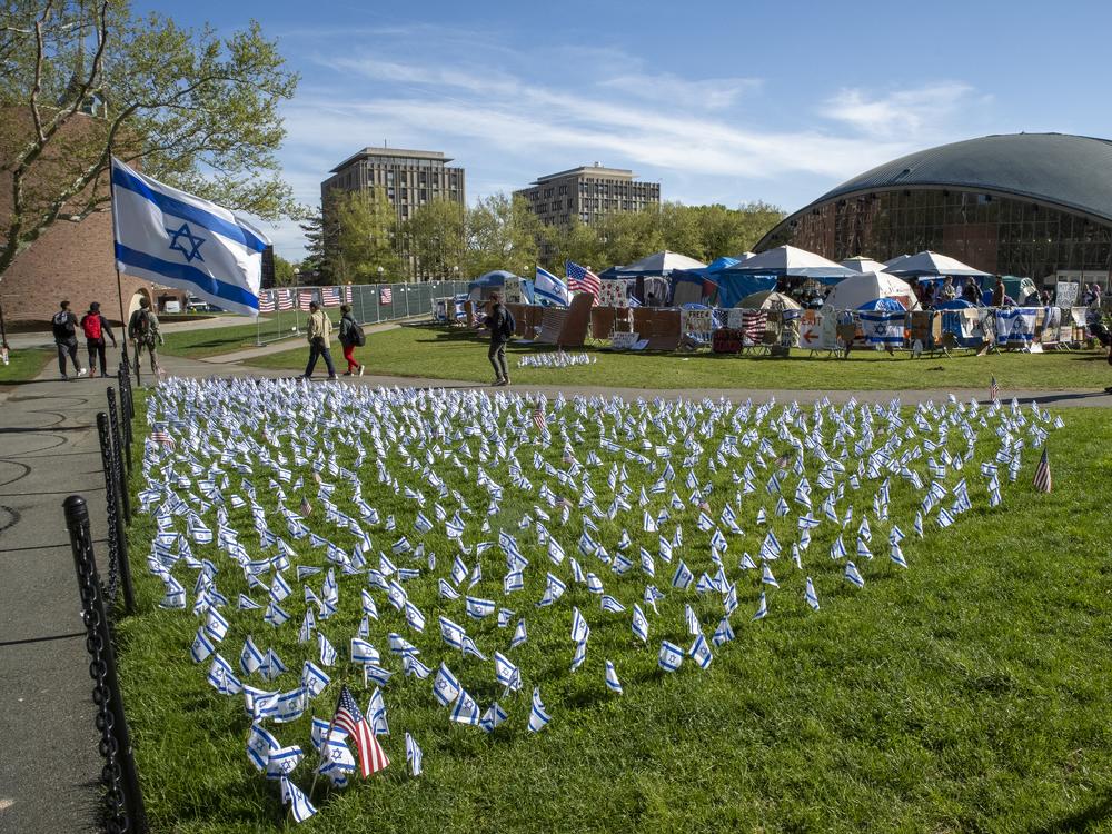 Israeli flags fly in front of a pro-Palestinian encampment in May on the lawn of the Stratton Student Center campus at the Massachusetts Institute of Technology in Cambridge, Mass.