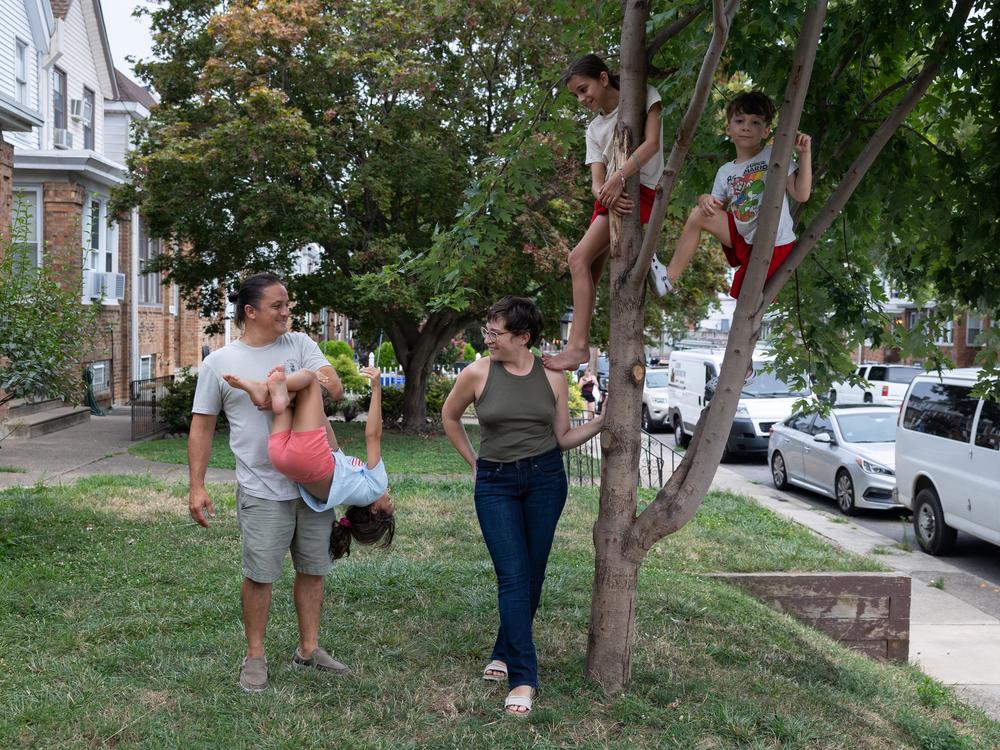 Andrew and Ashley DiDonato with their children (from left), Liliana, Rosalie, and Massimo outside their home in Philadelphia on July 22, 2024.