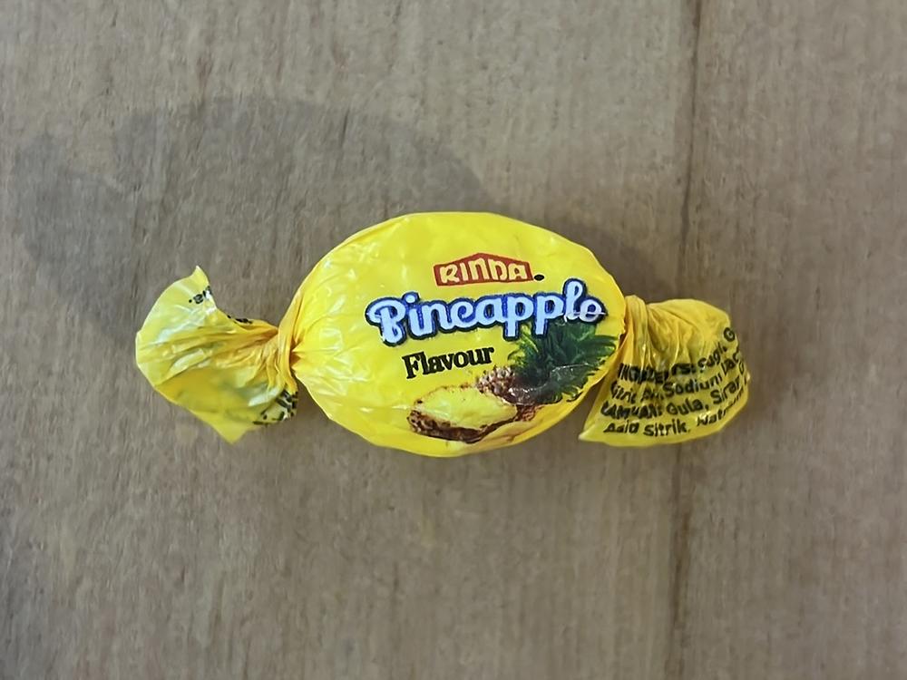 In this photo provided by the NZ Drug Foundation, a pineapple flavored candy filled with a potentially lethal dose of methamphetamine is displayed Tuesday  in Auckland, New Zealand.