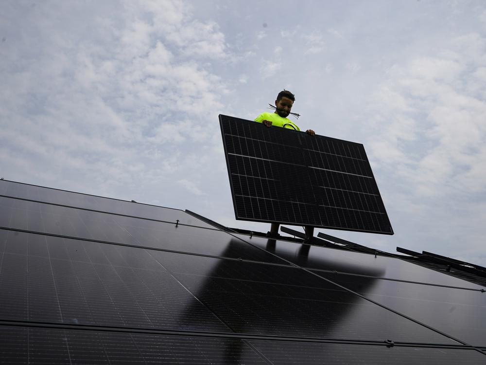Solar panels being installed on the roof of a home in Frankfort, Ky., in 2023. As complaints against solar companies have increased, some installers are working to repair the industry's reputation. 