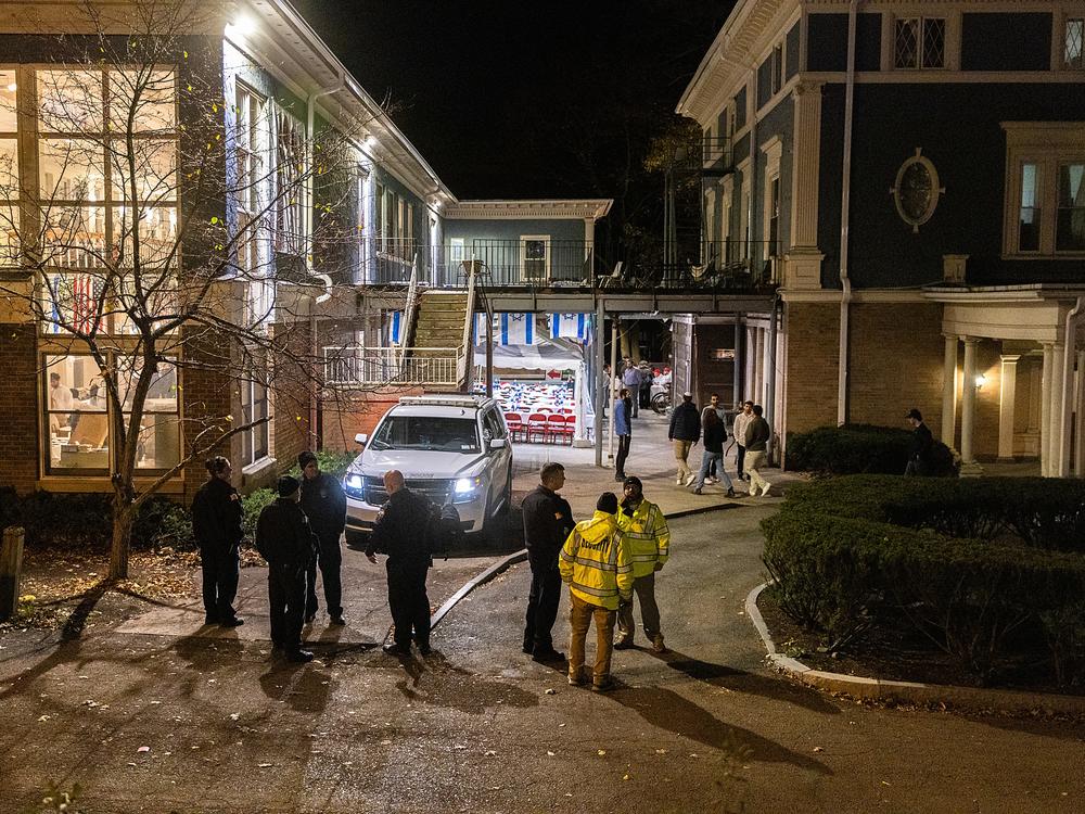 Police and security stand outside the Center for Jewish Living at Cornell University in Ithaca, N.Y., in early November, after antisemitic threats left the community on edge. 