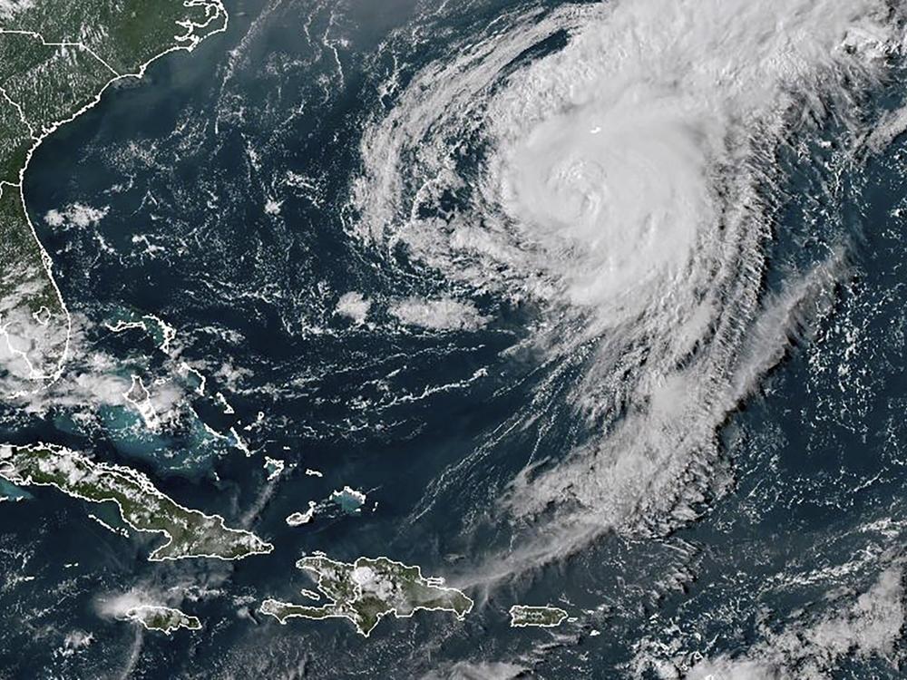 This GOES-16 GeoColor satellite image taken at 4:40 p.m EDT and provided by National Oceanic and Atmospheric Administration (NOAA) shows Hurricane Ernesto in the Atlantic Ocean south-southwest of Bermuda, on Friday.