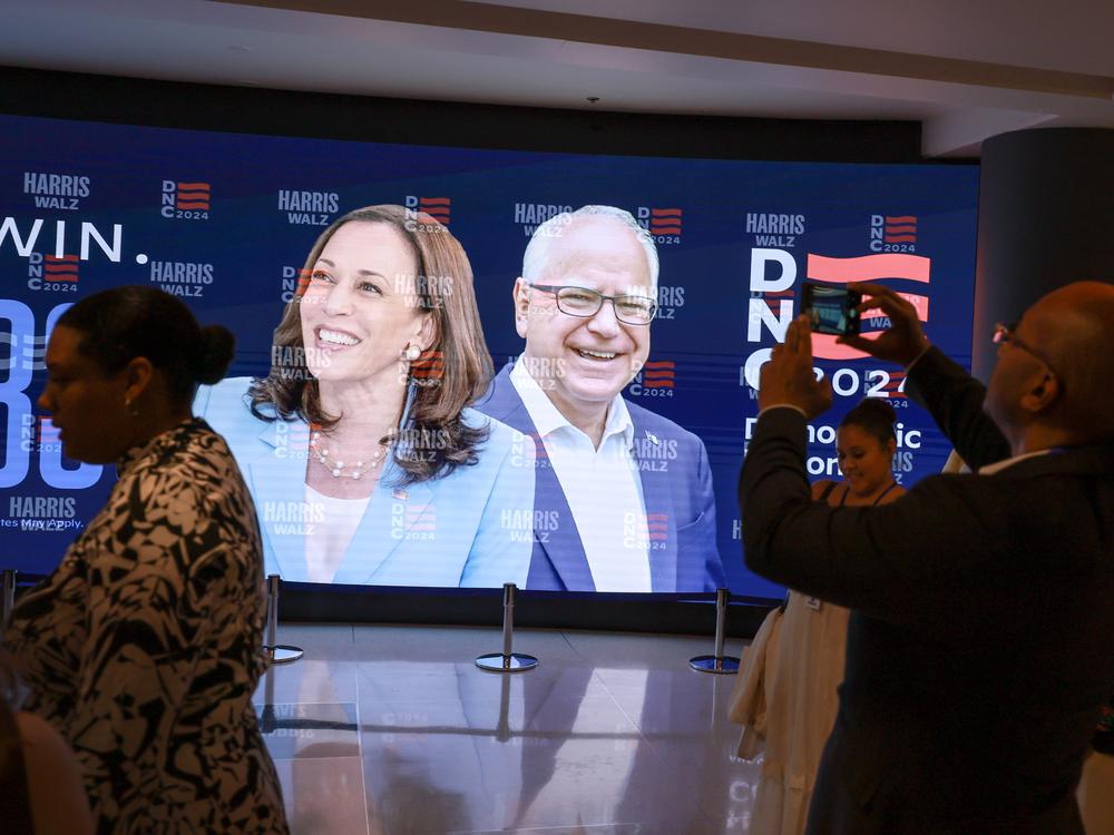 A sign featuring Democratic presidential candidate Vice President Harris and her running mate Minnesota Gov. Tim Walz at the United Center before the start of the Democratic National Convention.