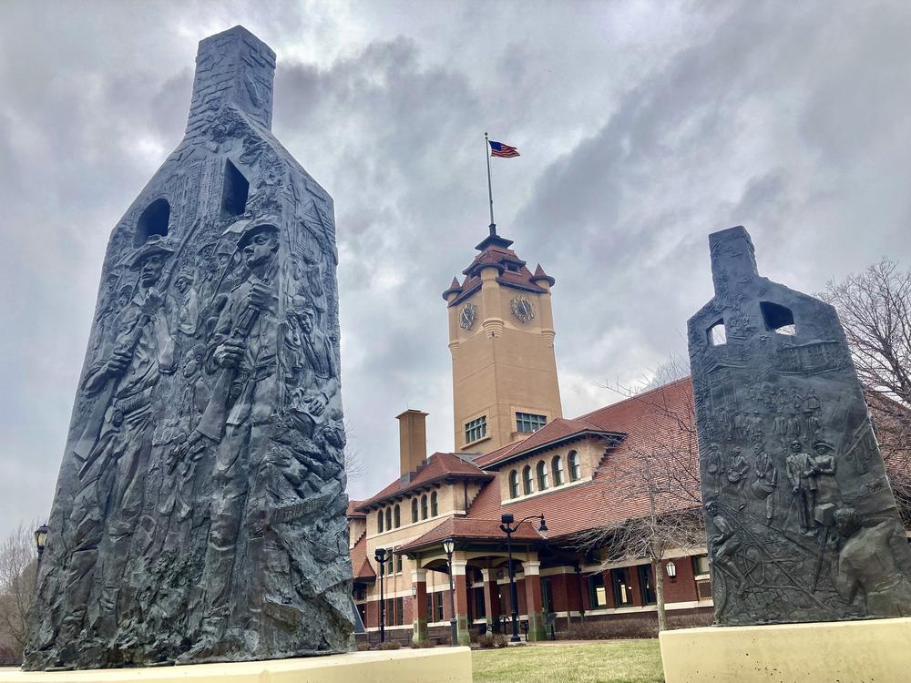 Sculptures representing charred chimneys rising from the smoldering rubble of burned-out buildings make up the centennial memorial of the 1908 race riot, entitled <em>Acts of Intolerance</em> by Preston Jackson, on March 22, 2023, in Springfield, Ill. 