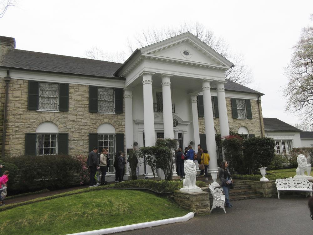This March 13, 2017, photo shows visitors getting ready to tour Graceland in Memphis, Tenn. 