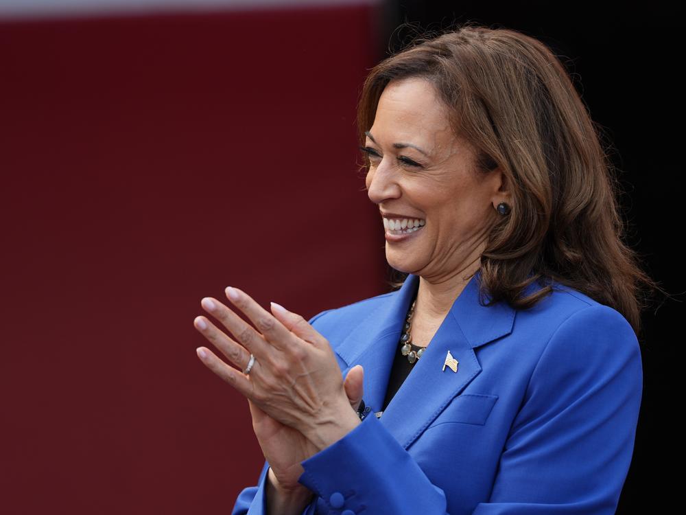 Democratic presidential nominee and Vice President Kamala Harris greets members of the Aliquippa High School football team during a campaign stop at their school, Sunday in Aliquippa, Pa.