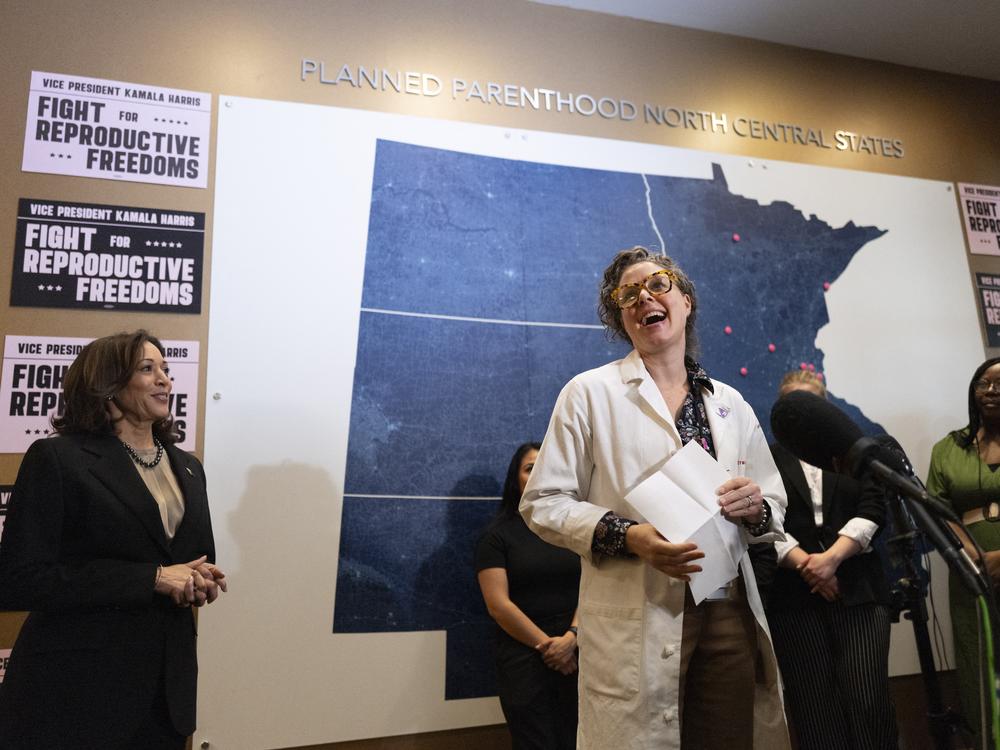 Vice President Harris listens as Dr. Sarah Traxler speaks during a visit to a Planned Parenthood clinic in Saint Paul, Minn., on March 14, 2024.
