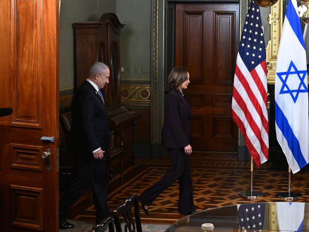 Vice President Harris and Israeli Prime Minister Benjamin Netanyahu arrive for a meeting in the vice president's ceremonial office in the Eisenhower Executive Office Building on July 25, 2024.
