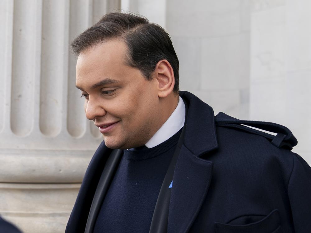 George Santos leaves the Capitol after being expelled from the House of Representatives in Washington on Dec. 1, 2023.