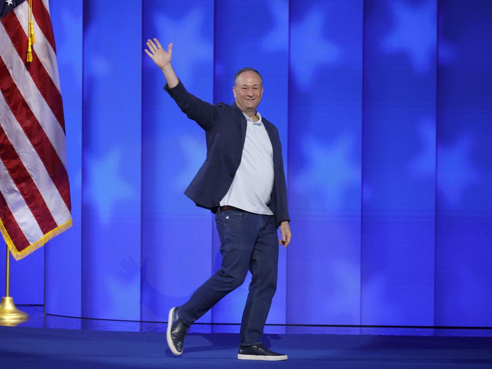 Second gentleman Doug Emhoff tests the stage ahead of the Democratic National Convention at the United Center on Aug. 19, 2024.