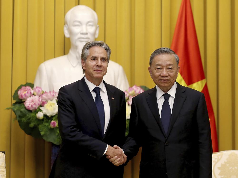 Vietnamese President To Lam, right, shakes hands with U.S. Secretary of State Antony Blinken at the Presidential Palace in Hanoi, Vietnam,  on July 27, 2024. 