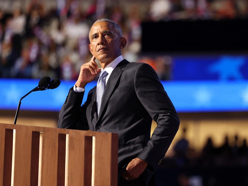 Former US President Barack Obama gestures as he speaks on the second day of the Democratic National Convention in Chicago, Illinois, on August 20, 2024.