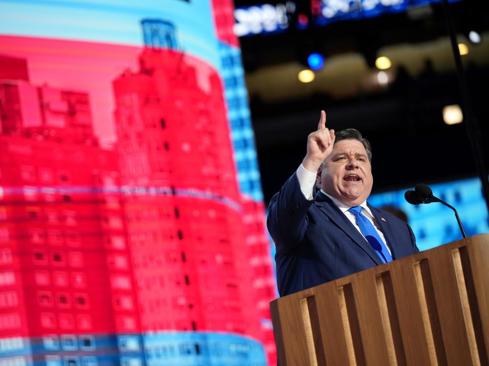 Illinois Gov. J.B. Pritzker speaks on stage during the second day of the Democratic National Convention in Chicago, Illinois.