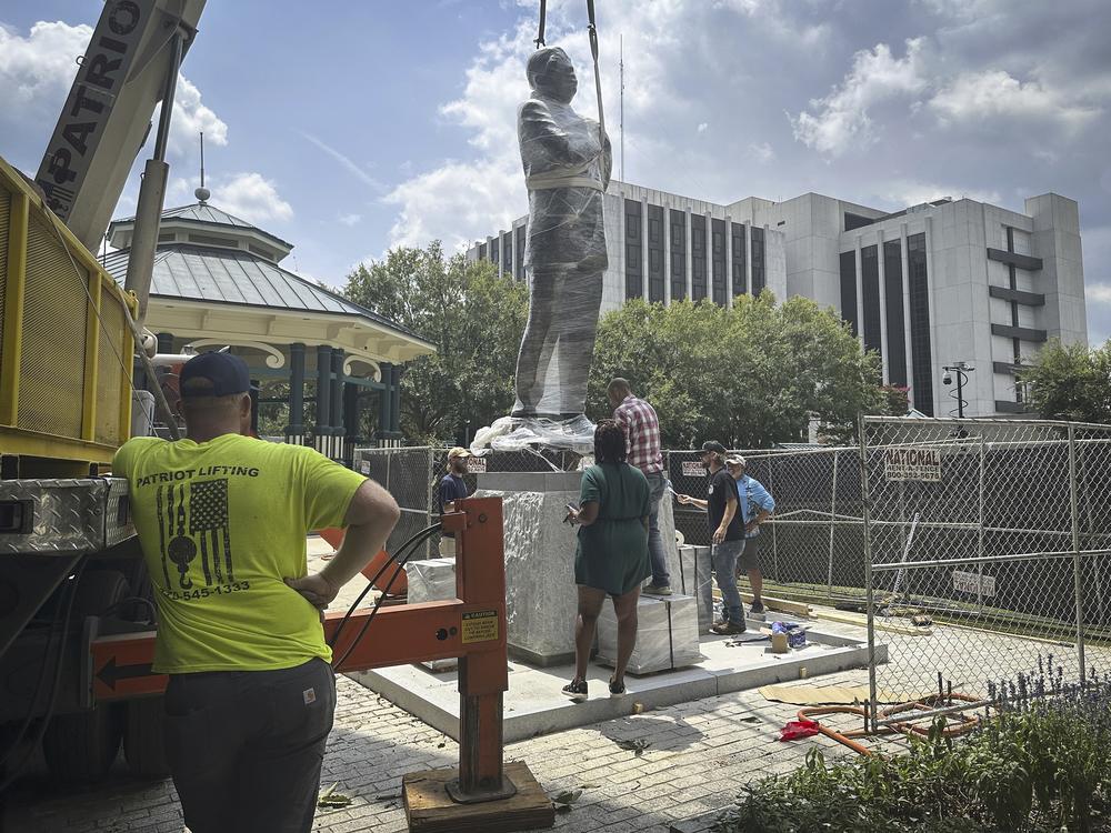 A large bronze statue of the late civil rights leader and politician Rep. John Lewis was installed last week in Decatur, Ga., where a monument to the Confederacy was removed in 2020.