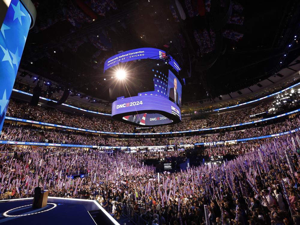 Attendees wave 