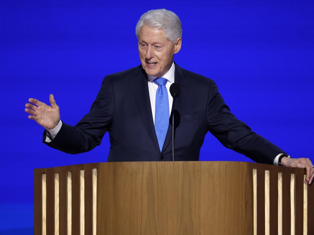 Former U.S. President Bill Clinton speaks on stage during the third day of the Democratic National Convention in Chicago, Illinois.