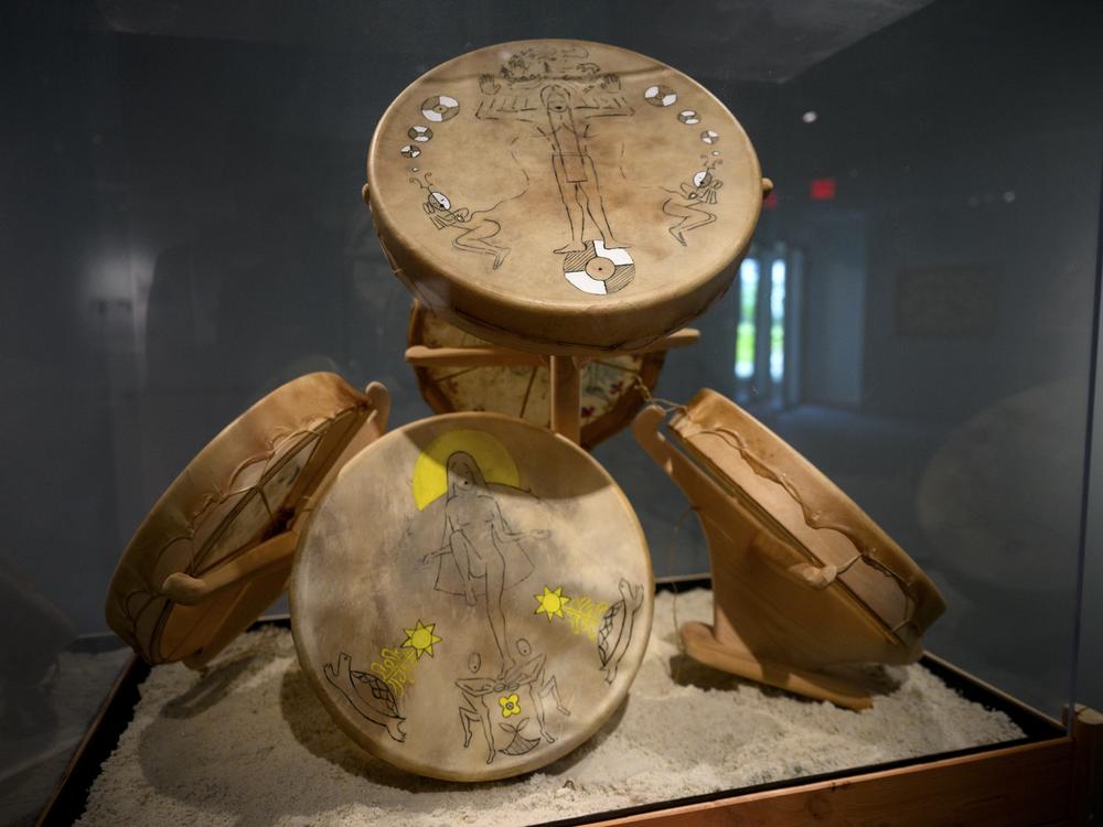 “Drums from All Directions” is a piece created by Sherenté Mishitashin Harris of the Narragansett tribe. It sits on display as part of the “Entwined” exhibition. 