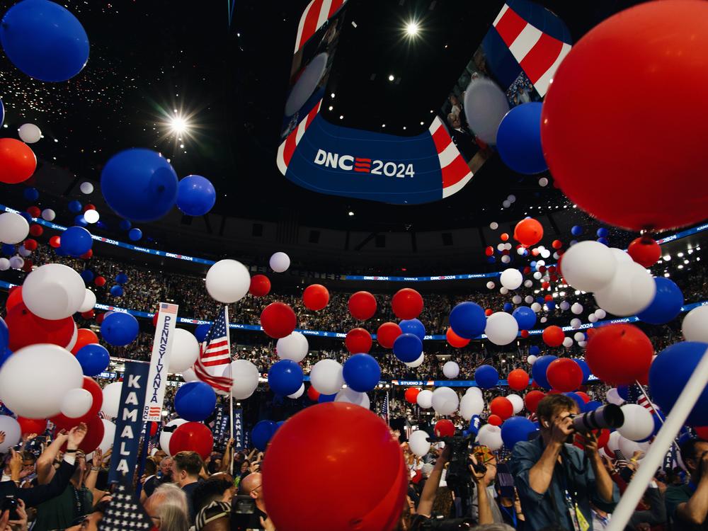 Balloons fall in celebration of Kamala Harris officially accepting presidential nomination.