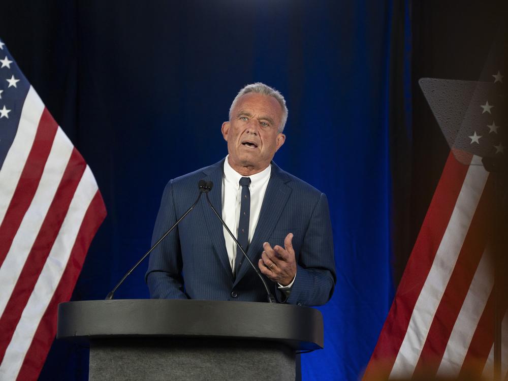 Robert F. Kennedy Jr. announces he's suspending his independent presidential campaign, during remarks in Phoenix Friday.
