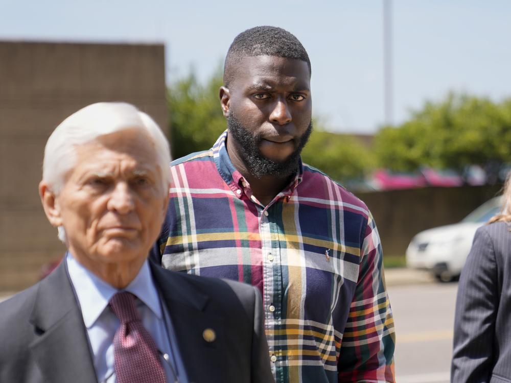 Emmitt Martin III, a former Memphis Police Department officer, second from left, accused of killing Tyre Nichols, walks into federal court on Friday in Memphis, Tenn.