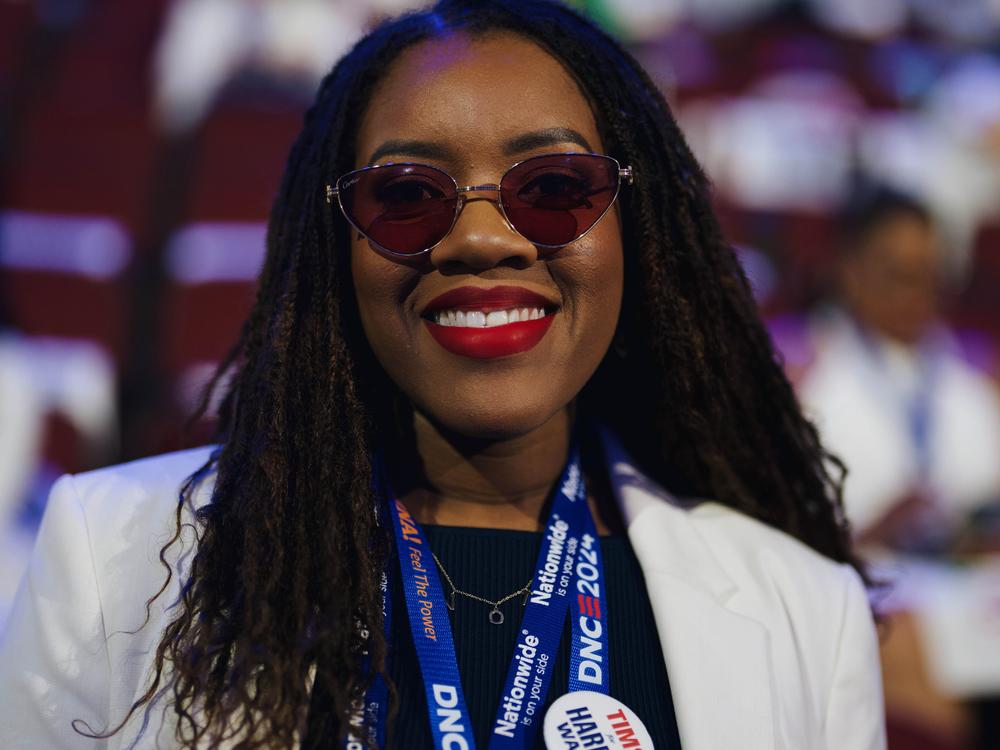 Desiree Tims, a delegate from Ohio, wore a white suit in honor of the suffragette movement. 
