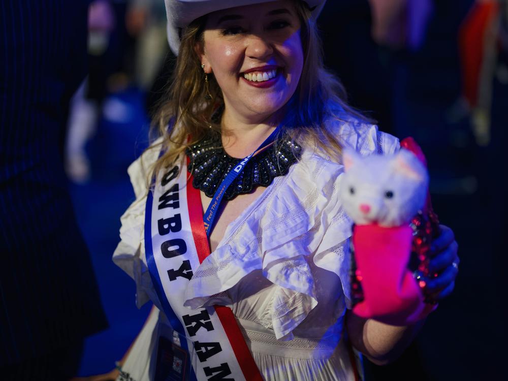 Washington delegate Ashley Fedan brought a stuff toy cat named Gina to the convention. 