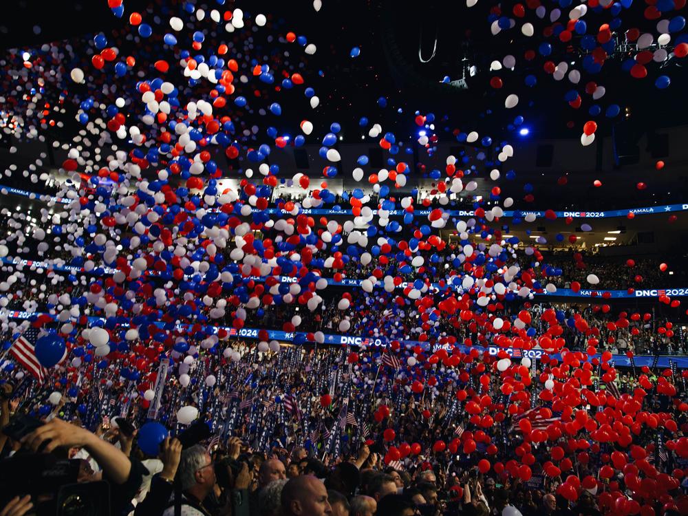 Balloons fall in celebration of Kamala Harris officially accepting the presidential nomination.