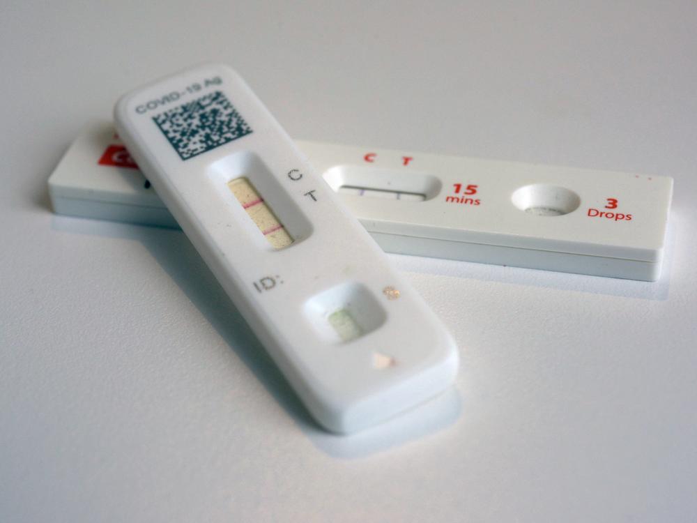COVID-19 antigen home tests show a positive result. Americans will be able to order four free COVID-19 tests at the end of September that will be delivered to their mailbox.