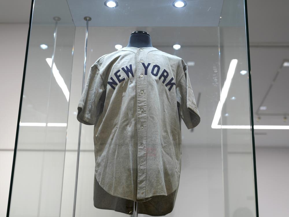 Babe Ruth's New York Yankees jersey, that he's said to have worn in a memorable Game 3 of the 1932 World Series, is displayed at Heritage Auction in Irving, Texas, days before its record sale.