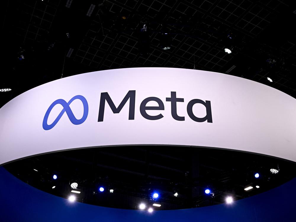 The Meta logo at a trade fair in France earlier this year. The social media firm says it has disrupted more accounts tied to Iranian hackers who are targeting the U.S. presidential election.