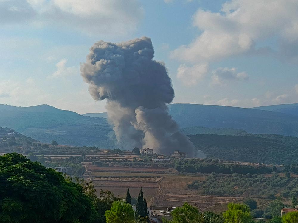 Smoke billows from the site of an Israeli airstrike on Zibqin in southern Lebanon on Sunday, amid escalations in the ongoing cross-border tensions as fighting continues between Israel and Hamas militants in the Gaza Strip. 