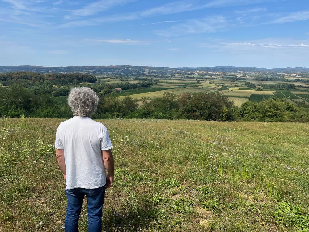 Vladan Jakovljevic looks out onto the Jadar Valley. The beekeeper says his bees, which pollinate crops throughout the valley, are threatened by potential environmental damage from Rio Tinto’s proposed lithium mine in the valley.