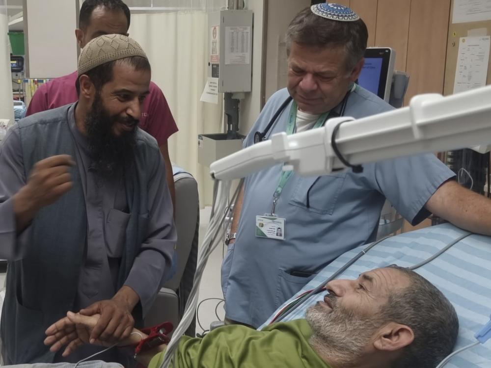 Qaid Farhan Alkadi, 52, who was held hostage by Hamas militants in Gaza, lies on a bed at the ‏Soroka Medical Center in Beersheba, Israel.