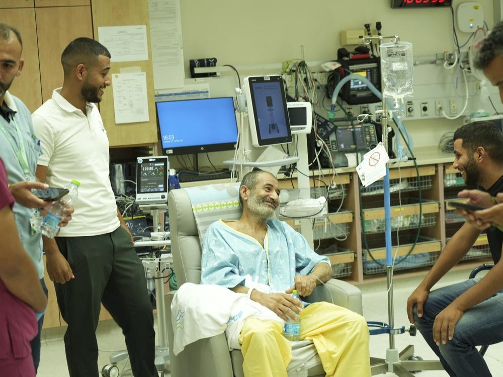 Qaid Farhan Al-Qadi, 52, sits in a room at the Soroka Medical Center in Beersheba, Israel, after Israeli forces say he was found alone in a tunnel in Gaza.