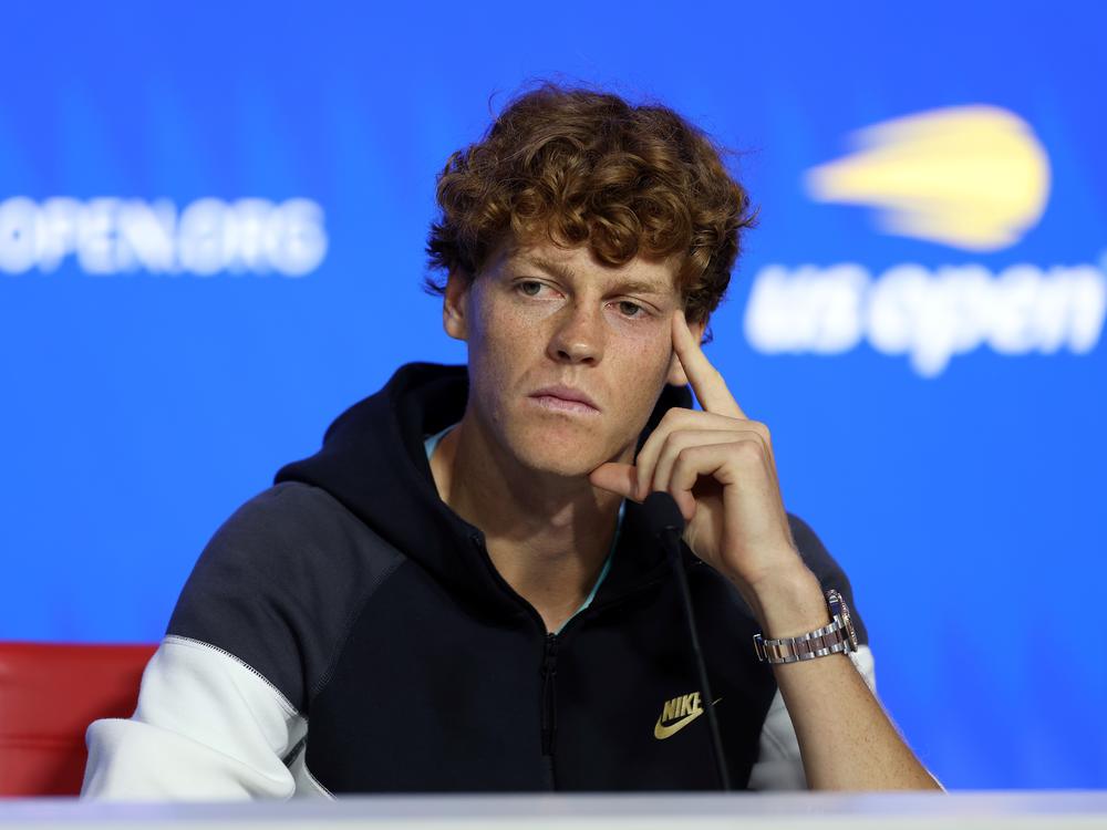 Italy's Jannik Sinner speaks to the media during a press conference ahead of the 2024 U.S. Open. The world's top-ranked player has twice tested positive for a banned substance earlier this year but was allowed to continue competing.