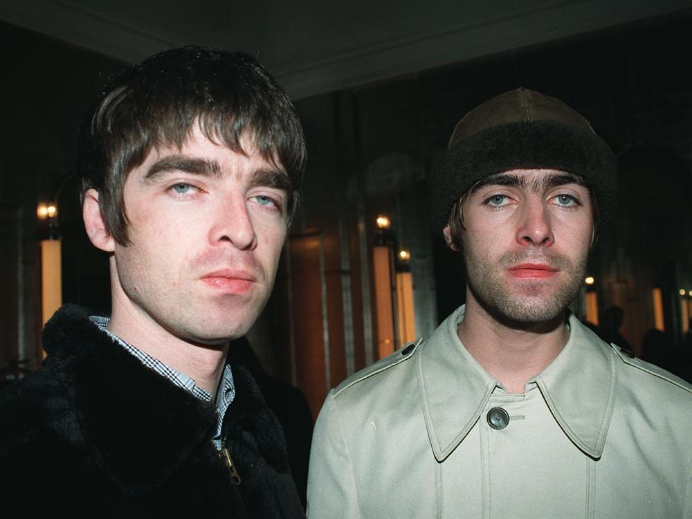 Liam (right) and Noel Gallagher, pictured in London in February 1999, were members of the beloved band Oasis from 1991 until it broke up in 2009. 